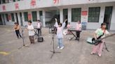 Music heals: rural rock band inspires hope in remote Chinese village