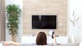 Couple Has Floating TV Without Any Wires Because Of a Floor Outlet