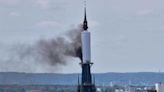 Spire of France's famous cathedral on fire