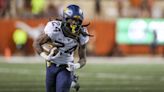 Mathis runs for 163, Legg’s FG lifts WVU over Baylor 43-40