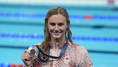 Summer McIntosh claims first Olympic swimming medal of her career with silver