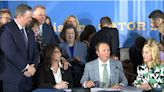 Girl standing behind Gov. Landry faints as he signs Ten Commandments bill to law