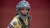 A regular at third base, Oak Forest’s Morgan Reczkiewicz gets chance to set up behind plate. ‘This was interesting.’