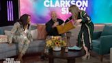 Kelly Clarkson Loses It, Attempts to Dry Jo Koy With a Pillow After He Spills Potted Plant on Himself | Video