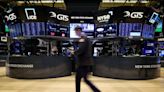 Wall Street jumps with rosy outlooks from companies