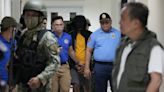 Philippine officials say suspect in the killings of 2 Australians and a Filipina has surrendered