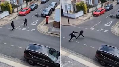 Terrifying moment thugs armed with Rambo knives fight in city street