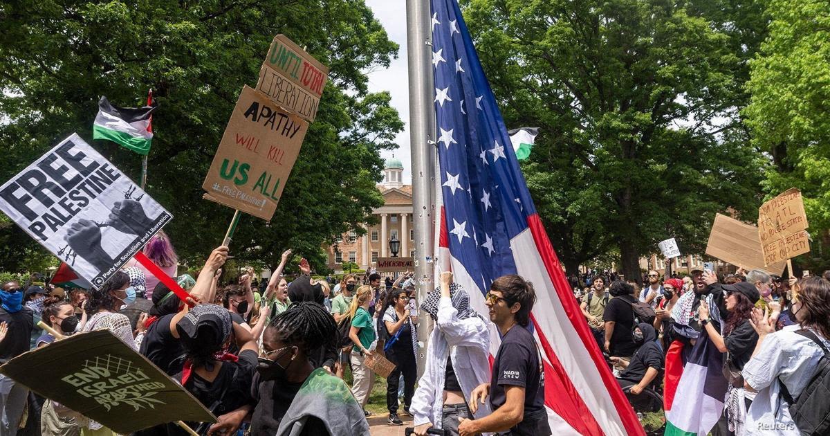 Video of fraternity brothers guarding US flag highlights campus political divide