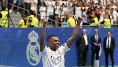 On ‘incredible day,’ Kylian Mbappé welcomed by Real Madrid fans at packed Santiago Bernabeu Stadium