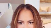 Chrissy Teigen Unveils Fierce Red Hair and Chic Layered Cut: Photo
