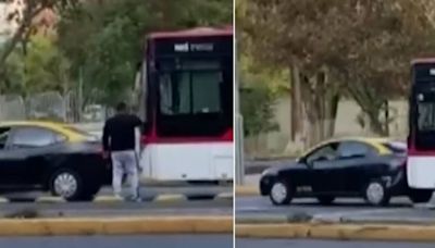 “¡Bájate, conch...! ¡Trata de chocarme!”: taxista chorizo desafió a chofer de bus Red y terminó con auto arrastrado