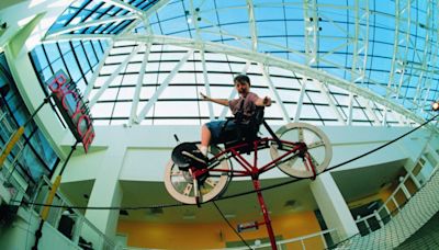The High Wire Bicycle, a way-cool California Science Center attraction, is back on the roll