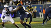 West Virginia gets strong rushing efforts from Jahiem White and CJ Donaldson in a 37-7 win over BYU