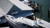 Fort Myers Beach buzzing about huge boat stuck on restaurant dock since Hurricane Ian