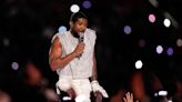 Usher performs hits at Super Bowl half-time show beside special guests