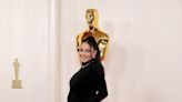 Vanessa Hudgens reveals pregnancy on Oscars red carpet