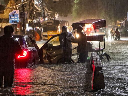 Delhi Deluge: Heavy rains kill 5, shools shut as roads in capital flooded, IMD issues red alert