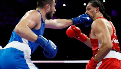 Boxer Jalolov beats Australia's Teremoana, gender row rolls on