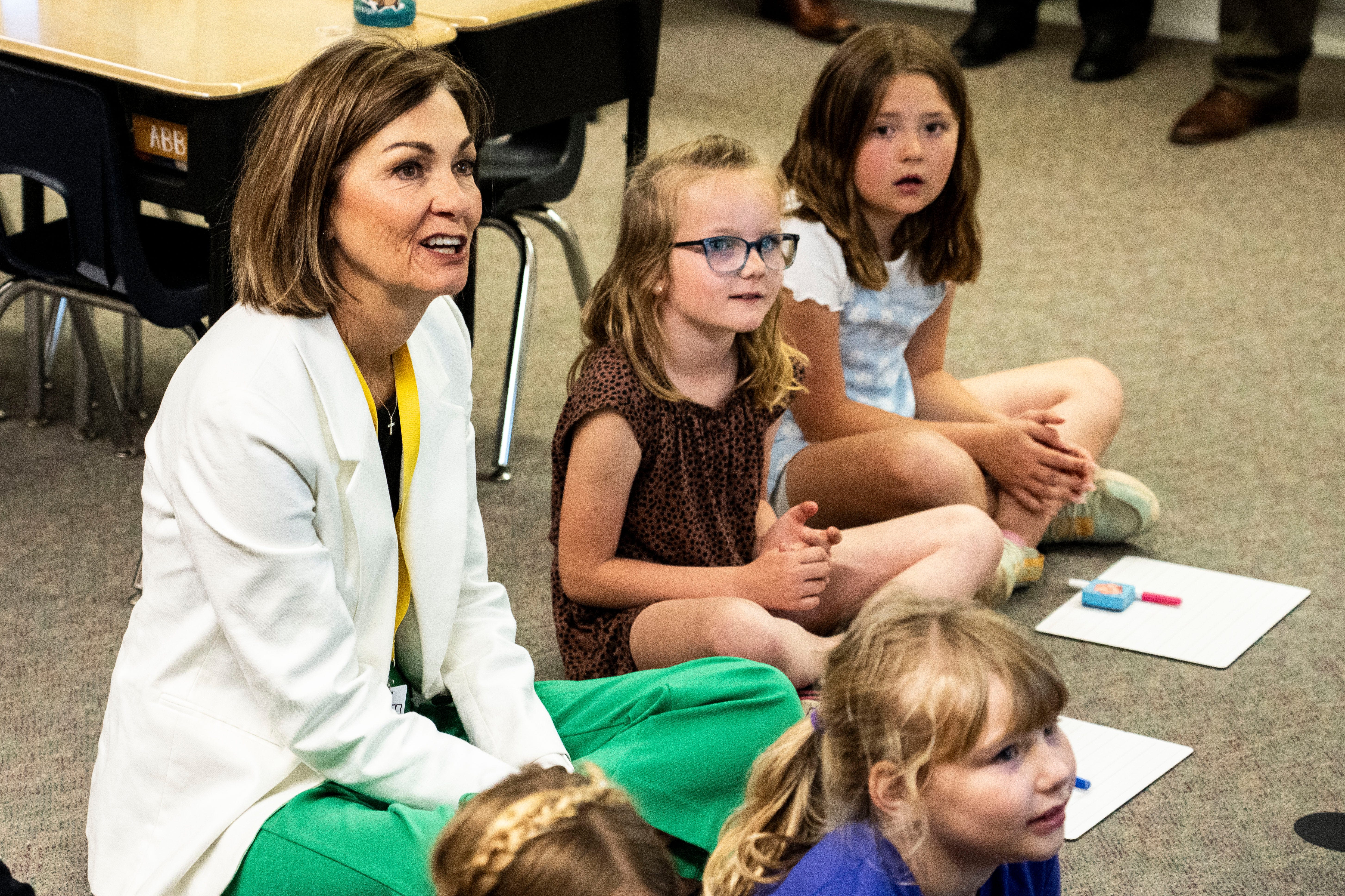 Gov. Kim Reynolds signs law to raise Iowa students' lagging literacy. The classroom impact: