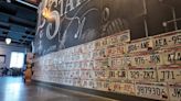 Badger State Brewing's new BRW-SKI-inspired wall of fame is coming together one Wisconsin license plate at a time