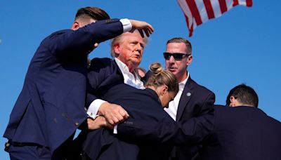 Trump Taken Off Stage After Apparent Shots Fired at Rally