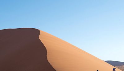 Officials in Namibia criticize tourists who took nude photos atop the Big Daddy dune at national park