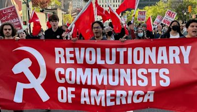 'Ideology linked to 100 million deaths': Leftists march with Communist flags in Philadelphia as US struggles to defend democratic values