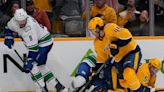 Di Giuseppe and Hoglander's second period goals lead Canucks to 3-2 defeat of the Predators