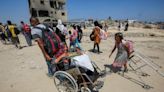 Israel issues evacuation orders in south Gaza, kills dozens of Palestinians