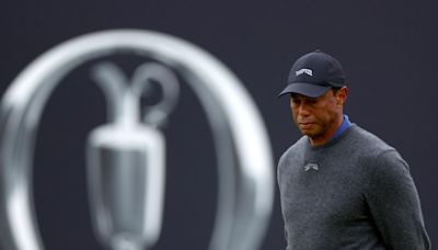 Tiger Woods is in danger of missing the British Open cut again after a 8-over 79 at Royal Troon
