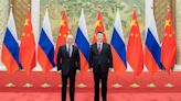 Putin y su homólogo chino Xi Jinping anuncian que reforzarán las relaciones estratégicas entre ambos países