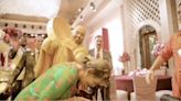 Anant Ambani turns buckets of haldi paste on mom Nita Ambani in wild new video; Ranveer Singh has the most fun. Watch
