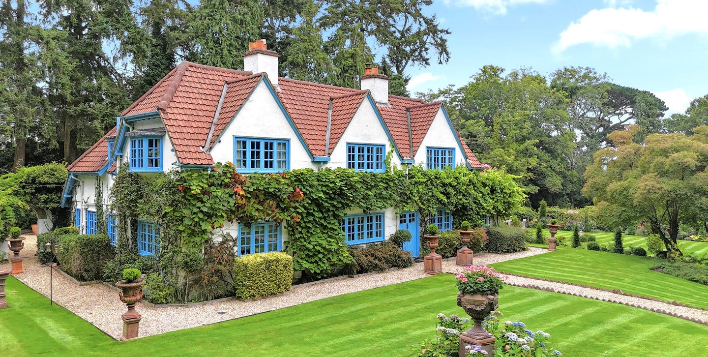 Stunning home with blue windows for sale is a lesson in kerb appeal