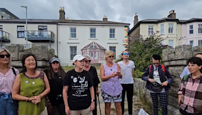 Fans sing outside former home of Sinéad O’Connor on anniversary of her death