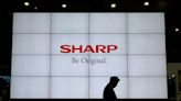 Foxconn, Sharp shares slide after Japan firm's surprise writedown