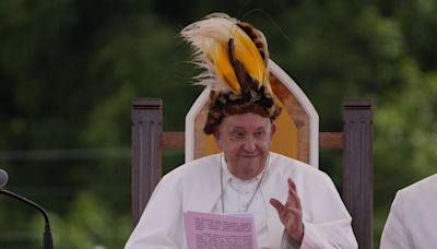 Pope arrives in remote Papua New Guinea jungle with humanitarian aid and toys