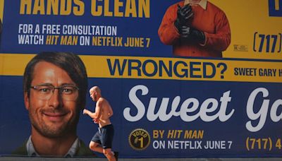 Need a 'Hit Man'? Netflix spoofs L.A.'s famous lawyer billboards to market new movie