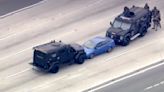 Pursuit standoff on the 91 Freeway ends in Anaheim but traffic remains stalled