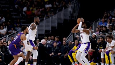 Family affair as LeBron, Bronny James make Lakers bow