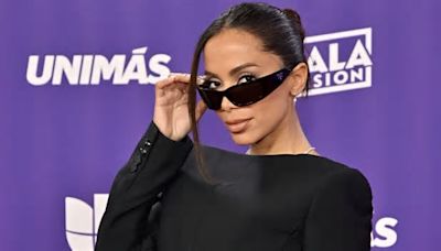 Anitta reps Men in Black chic with a high-fashion twist in corset mini dress and sunglasses