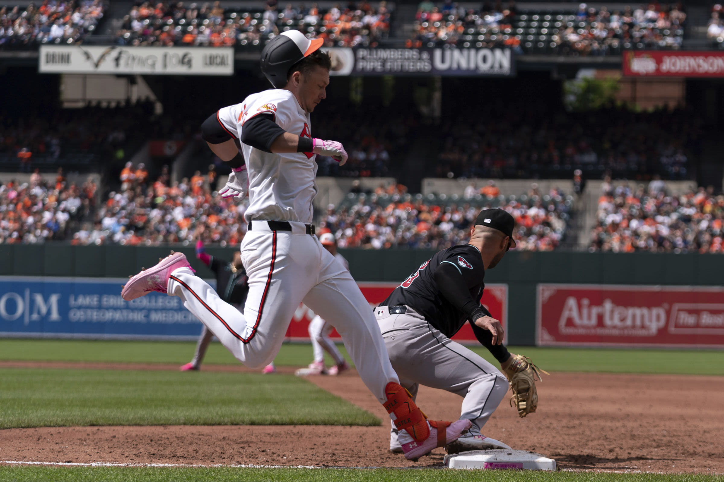 Diamondbacks avoid a sweep with a 9-2 victory on an unusually sloppy day for the Orioles - WTOP News