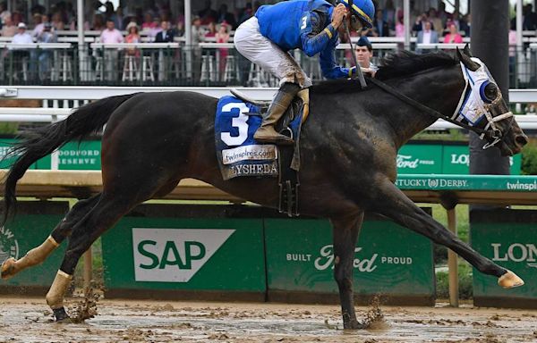 Jockey Florent Geroux is wearing customized Creed pants during the 2024 Kentucky Derby
