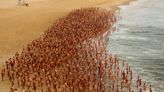 Photos of thousands of people who got naked on iconic Bondi Beach for a nude shoot to raise skin cancer awareness