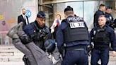 Police detained 173 people at a protest by climate activists outside the Paris headquarters of asset fund giant Amundi