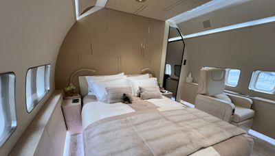 See inside the first private-jet version of the Boeing 737 Max. The extravagant plane is worth over $100 million and has a bar, two bedrooms, and huge showers.