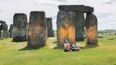 Climate protesters arrested after painting Stonehenge monument orange