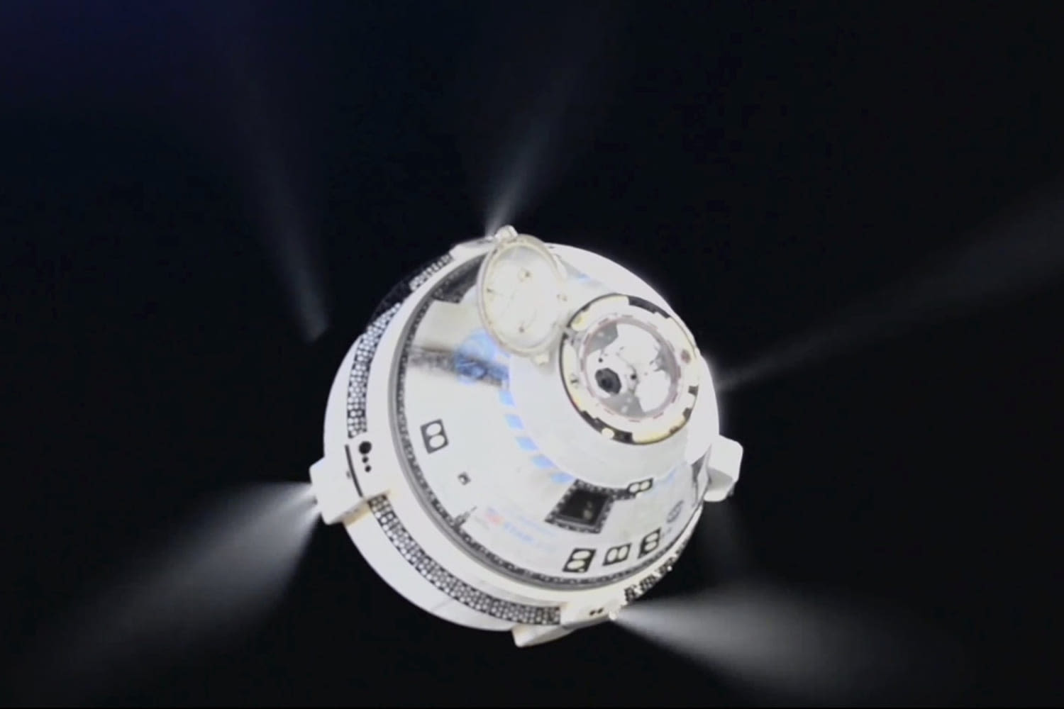 Boeing's beleaguered Starliner spacecraft begins its return journey with no astronauts onboard