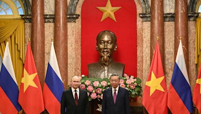 Putin arrives in Vietnam in bid to flex Russia’s power amid isolation campaign