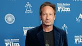 David Duchovny says a director used a megaphone to tell him when to orgasm during his first sex scene in 1991