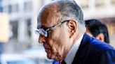 Rudy Giuliani is served indictment papers at his own birthday party after mocking Arizona attorney general